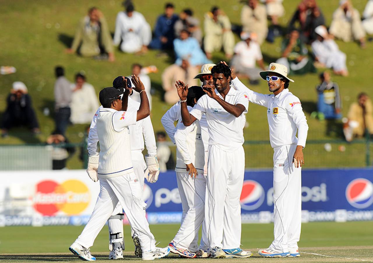 Shaminda Eranga celebrates the wicket of Younis Khan, Pakistan v Sri Lanka, 1st Test, Abu Dhabi, 2nd day, January 1, 2014