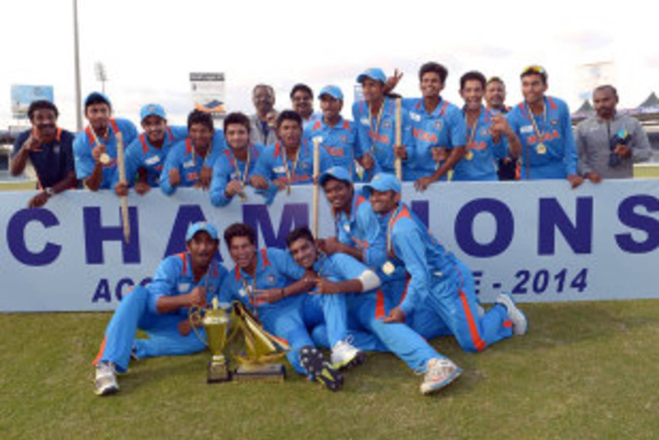 India's victorious Under-19 players pose with the ACC Under-19 Asia Cup, India Under-19 v Pakistan Under-19, Under-19 Asia Cup, final, Sharjah, January 4, 2014