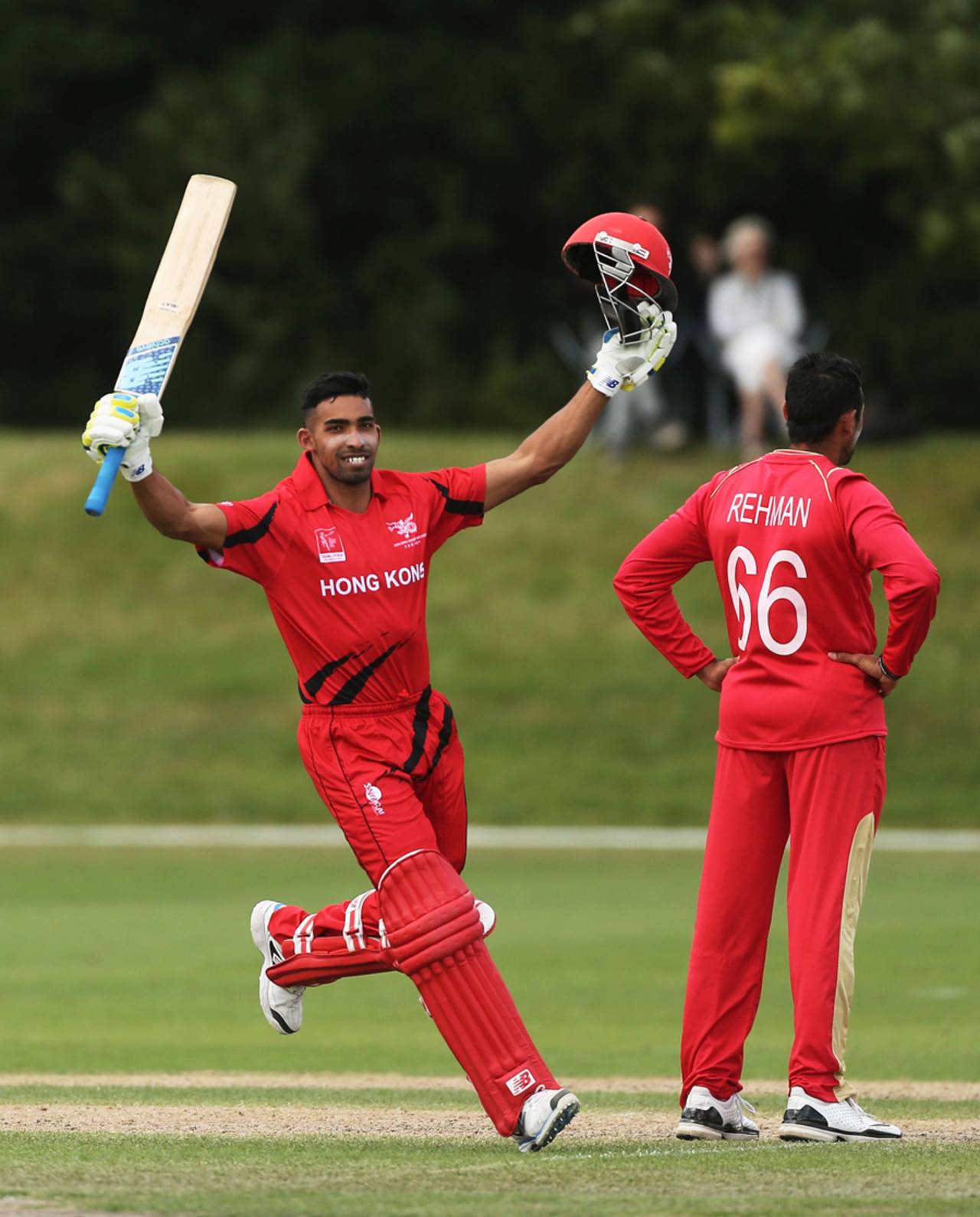 Irfan Ahmed of Hong Kong celebrates reaching his century during the ICC Cricket World Cup Qualifier match between Canada and Hong Hong at Main Power Oval in Rangiora on January 17, 2014 in Rangiora, New Zealand. (Photo by Joseph Johnson-IDI/IDI via Getty Images)