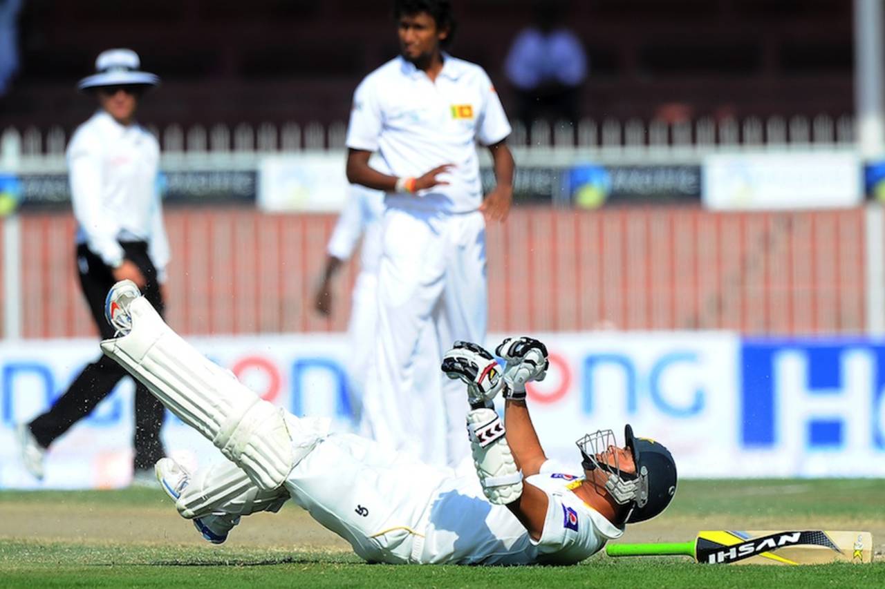 Azhar Ali after diving to make his crease, Pakistan v Sri Lanka, 3rd Test, Sharjah, 5th day, January 20, 2014