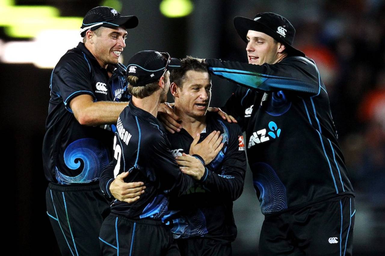 Nathan McCullum is surrounded after dismissing R Ashwin, New Zealand v India, 3rd ODI, Auckland, January 25, 2014