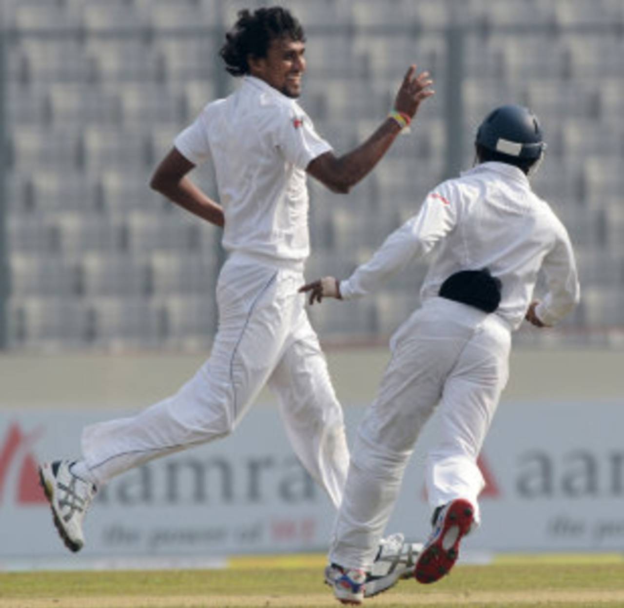 Suranga Lakmal is all smiles after picking up a wicket, Bangladesh v Sri Lanka, 1st Test, Mirpur, 4th day, January 30, 2014