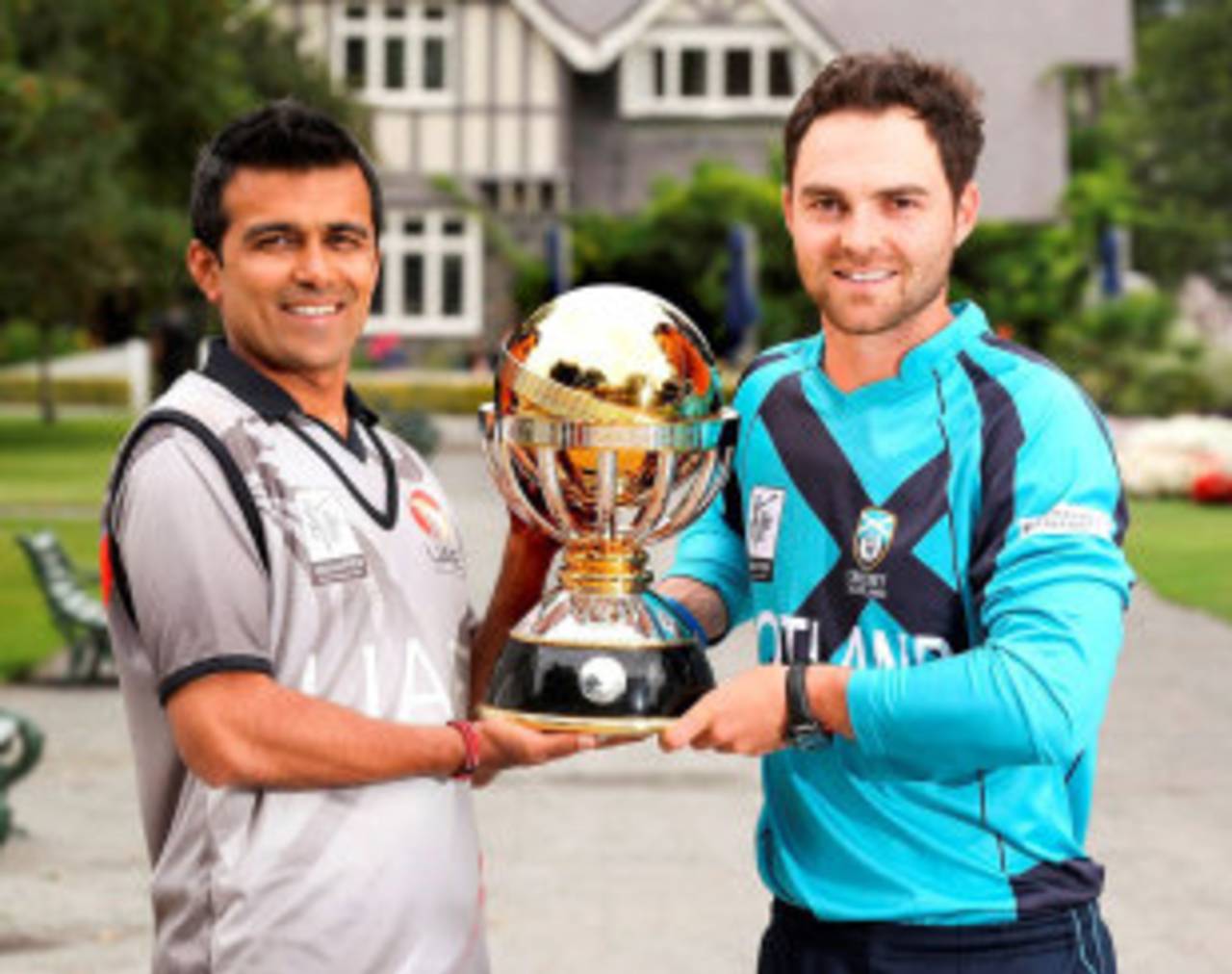 Khurram Khan and Preston Mommsen with the World Cup 2015 Qualifier Trophy on the eve of the final, Scotland v UAE, Cricket World Cup Qualifier, final, Lincoln, February 1, 2014