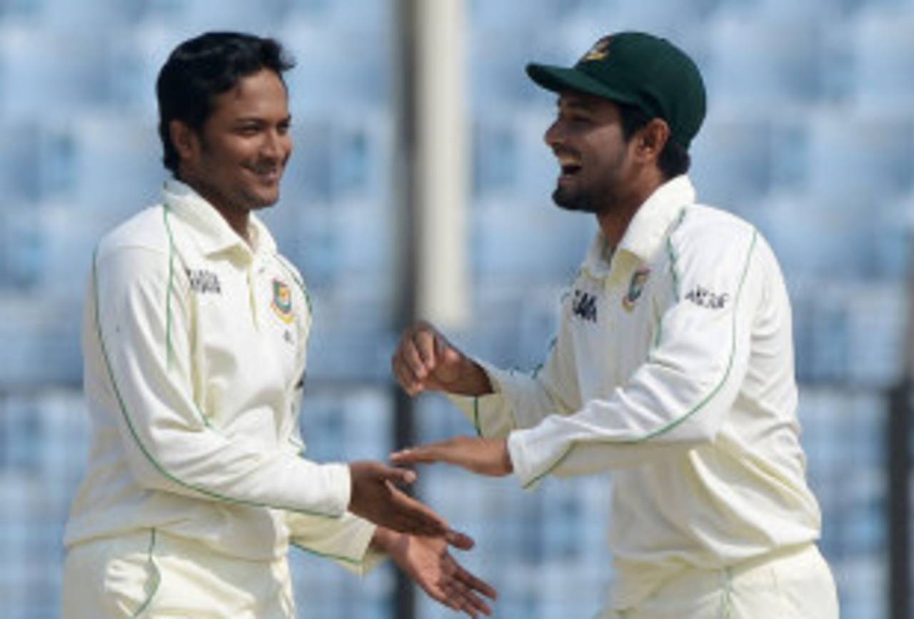 Shakib Al Hasan and Mahmudullah celebrate a wicket, Bangladesh v Sri Lanka, 2nd Test, Chittagong, 2nd day, February 5, 2014