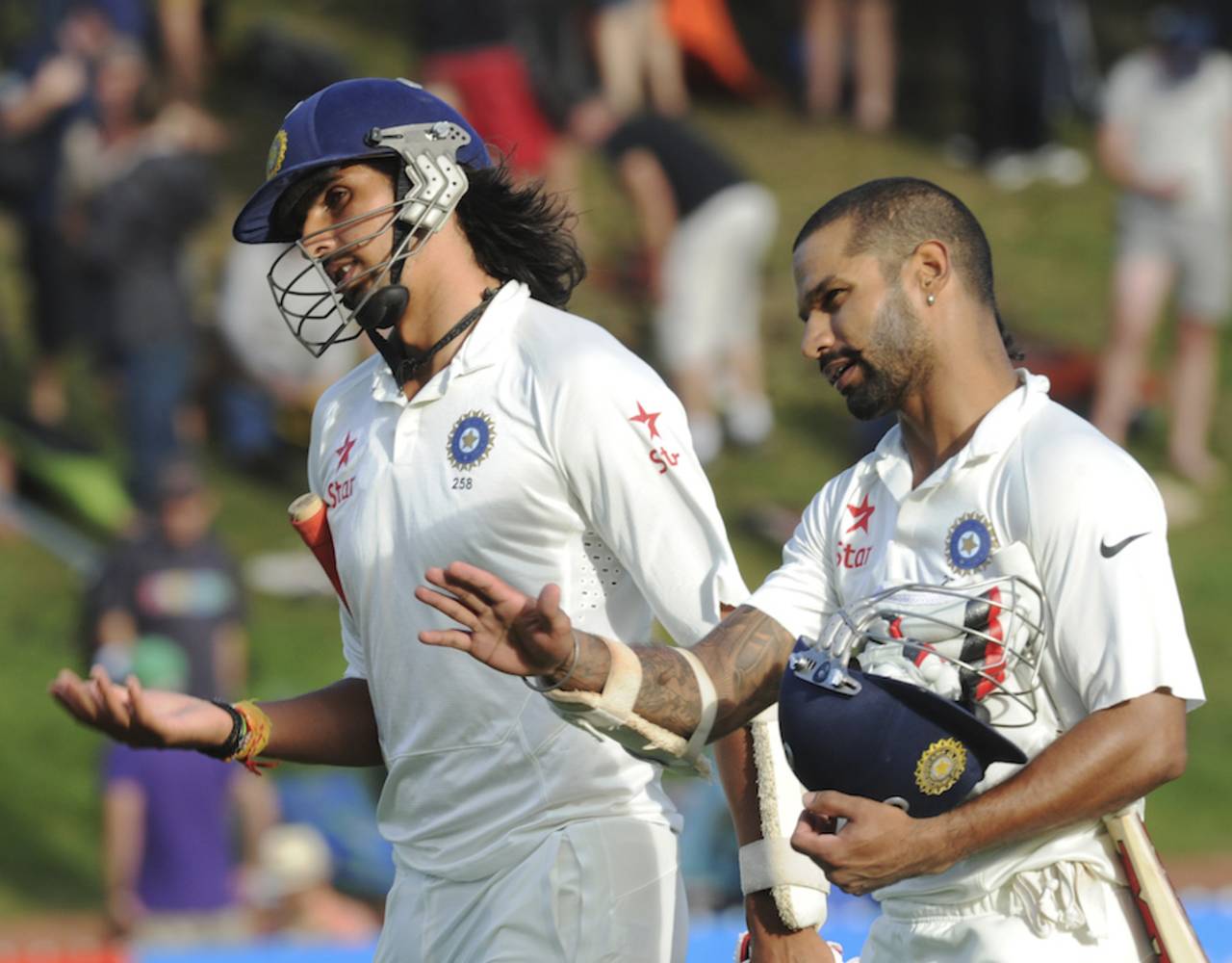 Ishant Sharma and Shikhar Dhawan walk back at the close of play, New Zealand v India, 2nd Test, Wellington, February 14, 2014