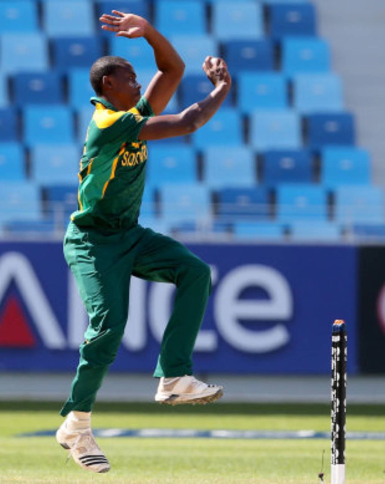 Kagiso Rabada in his delivery stride, South Africa Under-19s v West Indies Under-19s, ICC Under-19 World Cup, Dubai, February 14, 2014