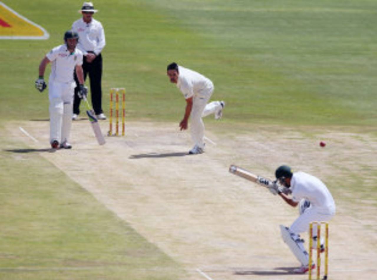Robin Peterson ducks a short ball by Mitchell Johnson, South Africa v Australia, 1st Test, Centurion Park, 3rd day, February 14, 2014