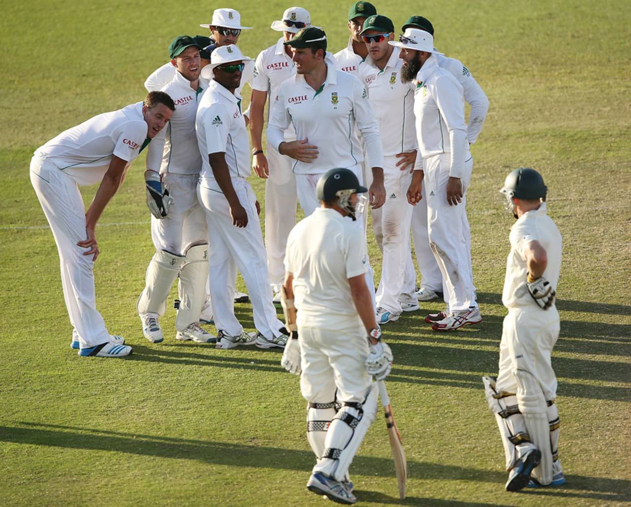 The players await an lbw decision from a review, South Africa v Australia, 2nd Test, Port Elizabeth, 4th day, February 23, 2014