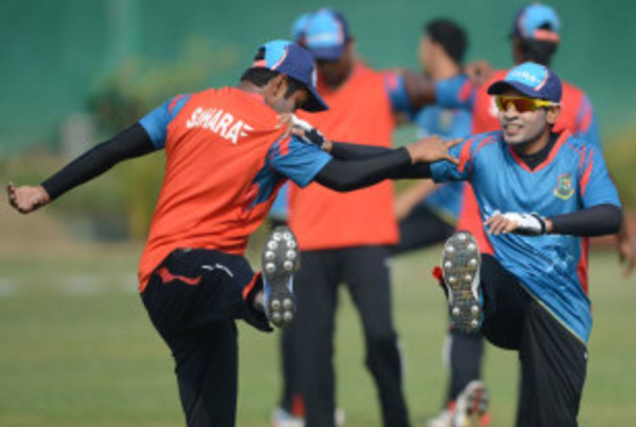 Mushfiqur Rahim warms up ahead of a practice session, Mirpur, February 24, 2014
