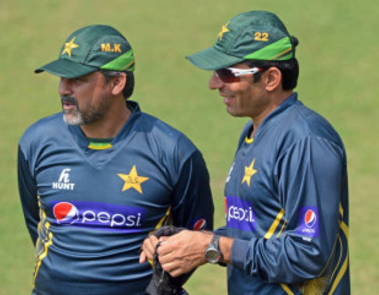 Moin Khan and Misbah-ul-Haq chat during a practice session, Mirpur, February 24, 2014