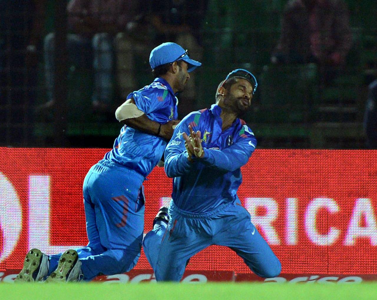 Ajinkya Rahane and Shikhar Dhawan dropped the ball after they both went for a catch, India v Sri Lanka, Asia Cup, Fatullah, February 28, 2014