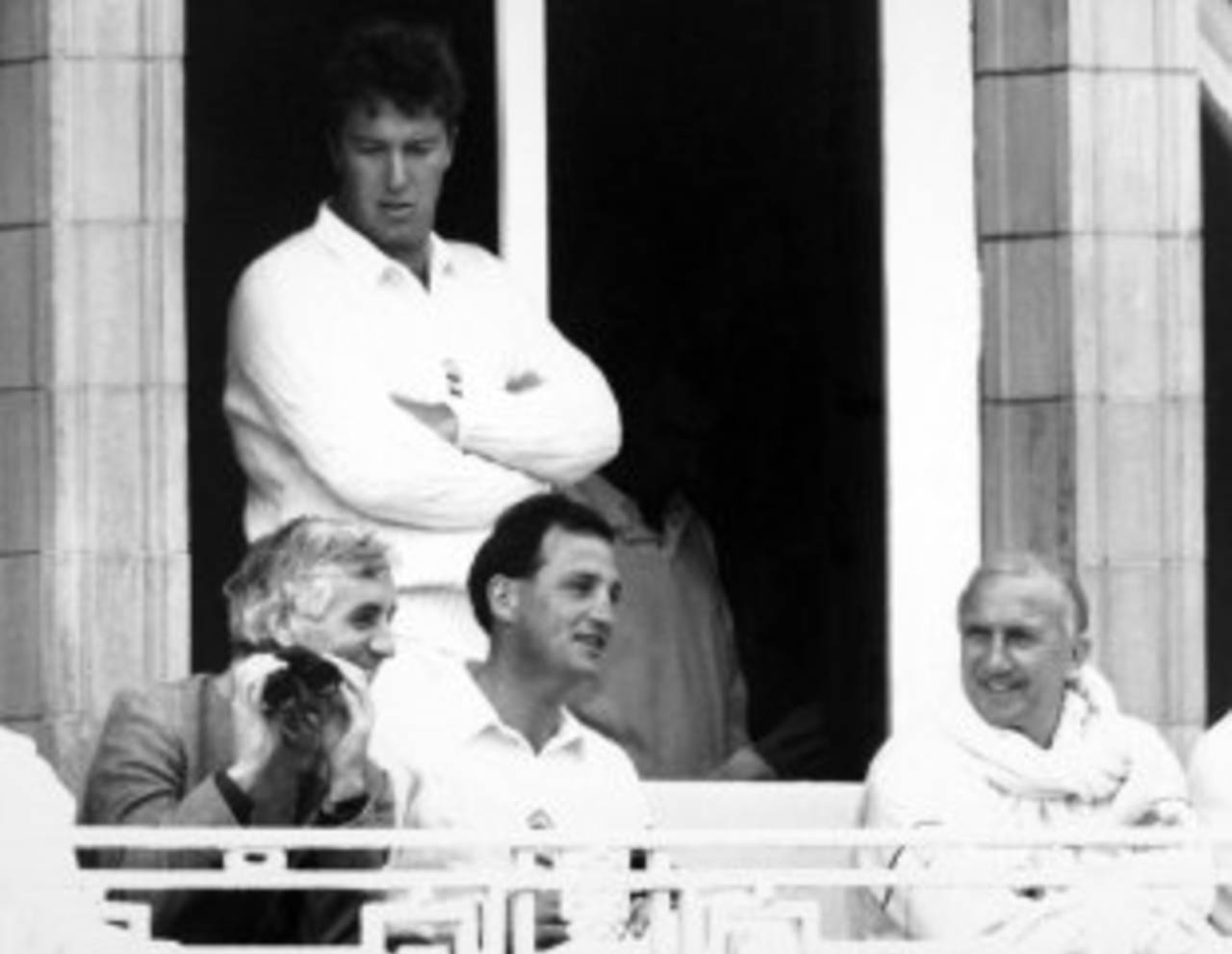 Former England captain Mike Brearely sits with current captain John Emburey and manager Micky Stewart in the balcony, and bowler Derek Pringle stands at the back, England v West Indies, 2nd Test, Lord's, June 17, 1988
