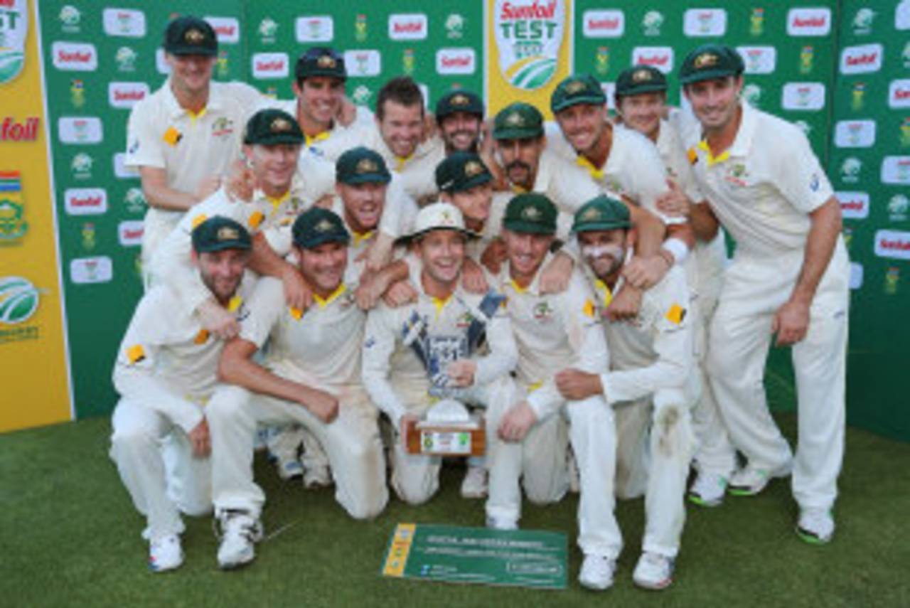 The Australians celebrate with the series trophy, South Africa v Australia, 3rd Test, Cape Town, 5th day, March 5, 2014