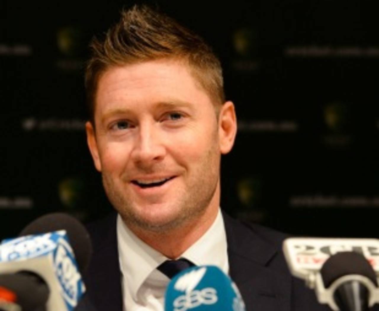 Michael Clarke speaks to reporters on his return to Sydney, March 7, 2014