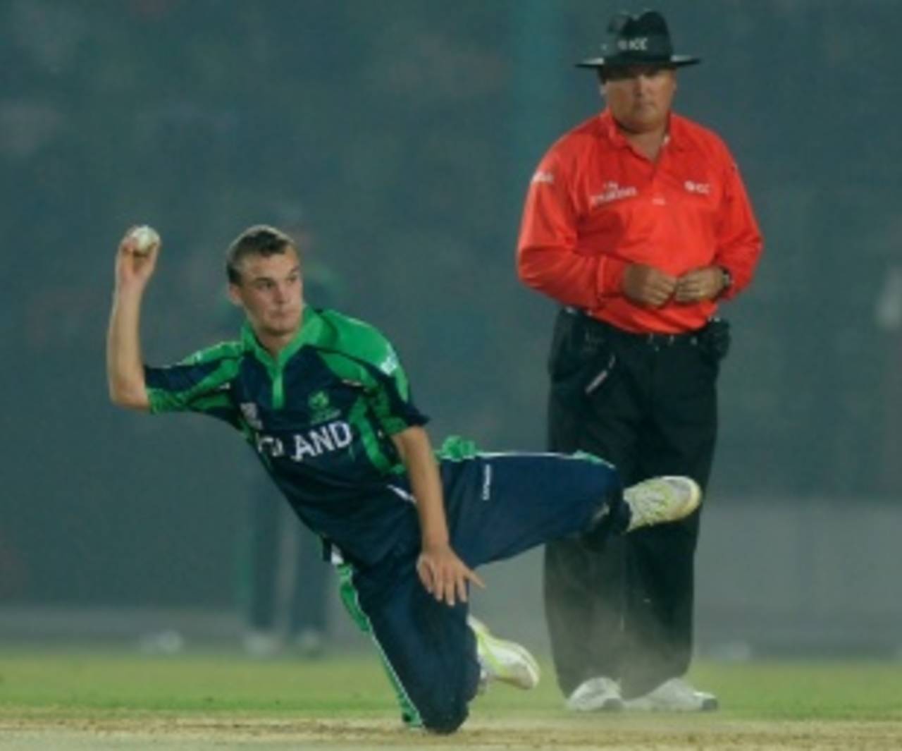 Andy McBrine fields off his own bowling, Ireland v Nepal, World T20 warm-up, Fatullah, March 12, 2014
