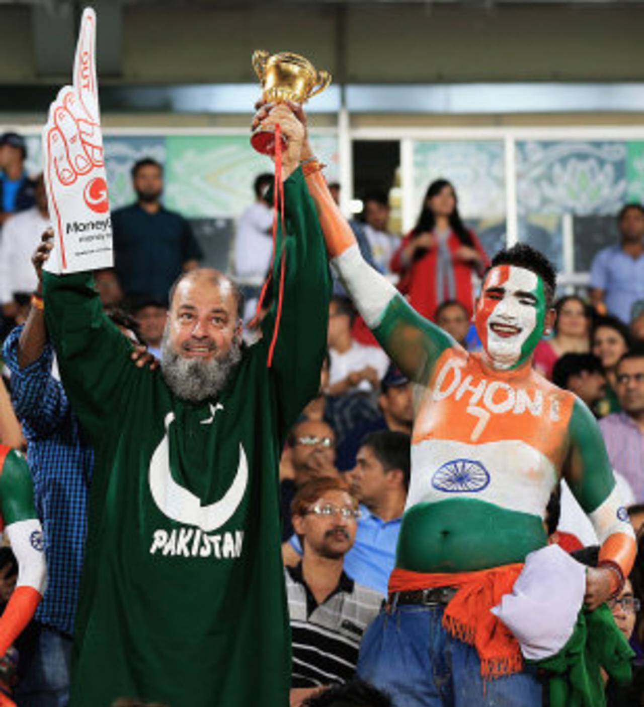 Rivalry on the pitch, friendliness in the stands, as two fans demonstrate, India v Pakistan, World T20, Group 2, Mirpur, March 21, 2014 