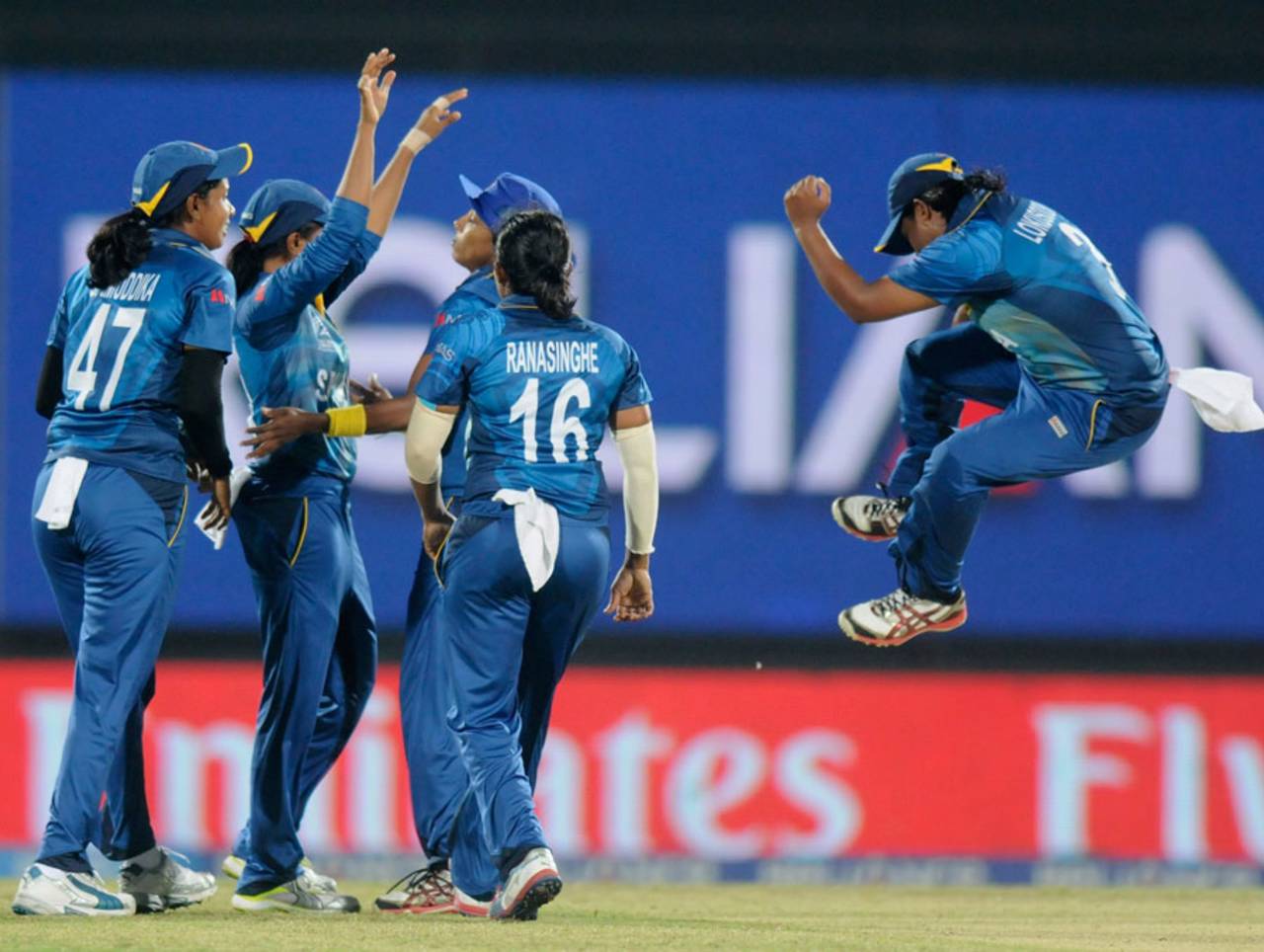 Sri Lankan fielders celebrate the fall of an Indian wicket, India v Sri Lanka, Women's World Twenty20 2014, Group B, Sylhet, March 24, 2014