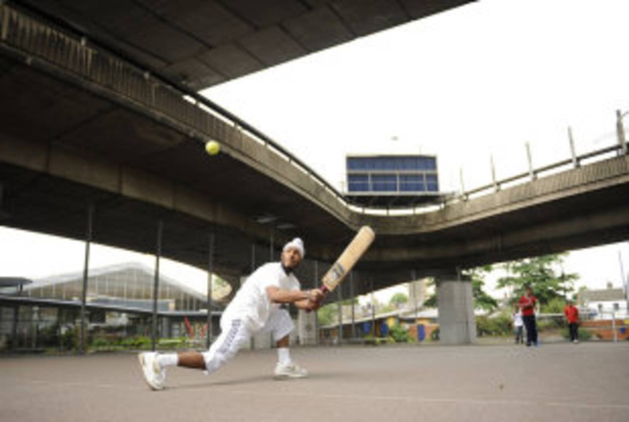 Tennis-ball cricket in the streets of England