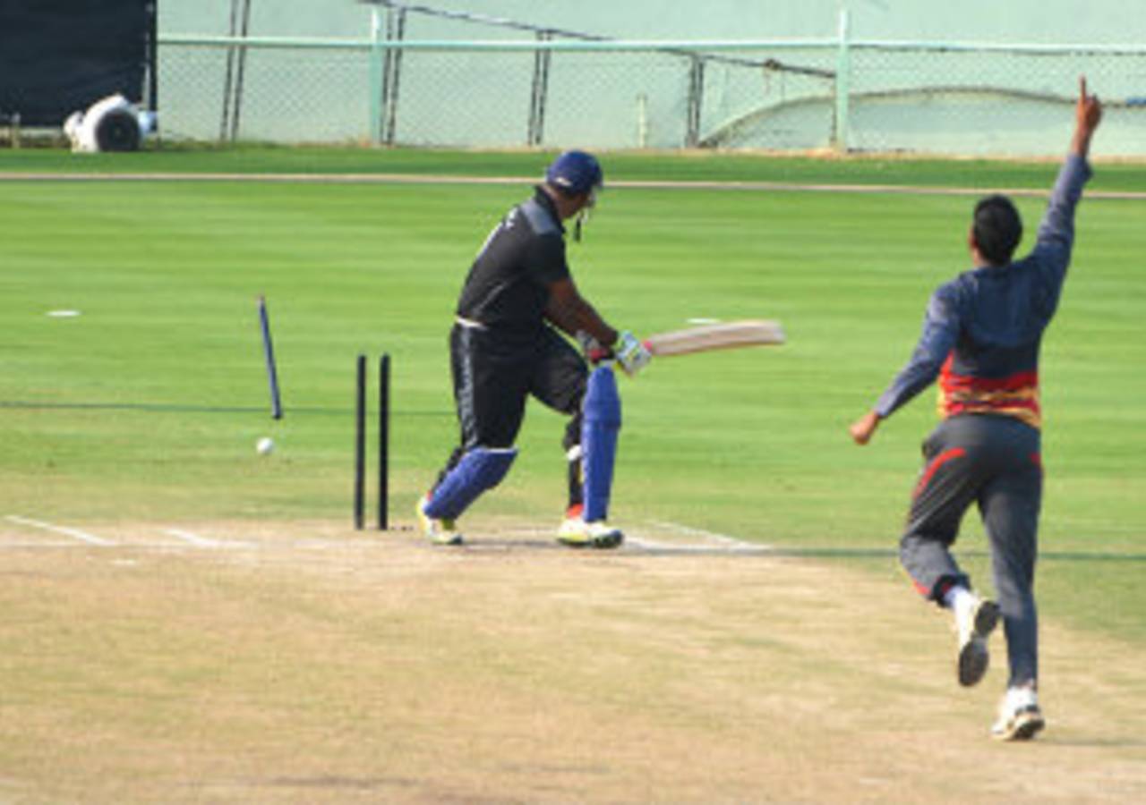 Karnataka's K Gowtham was bowled by Sayed Badiuzzama, Goa v Karnataka, Syed Mushtaq Ali Trophy, Visakhapatnam, April 4, 2014
