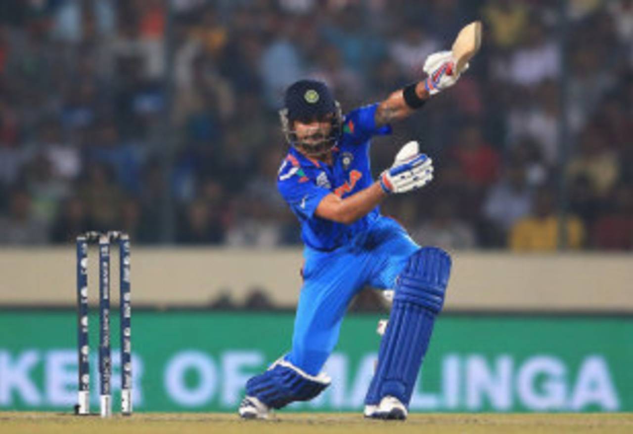 Virat Kohli plays a one-handed drive, India v Sri Lanka, final, World T20, Mirpur, April 6, 2014
