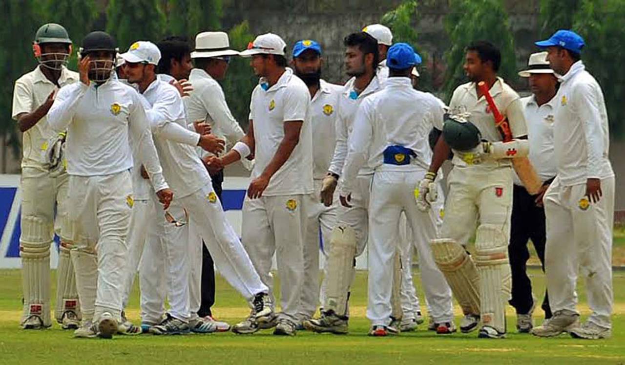 Players shake hands after Rangpur Division's 314-run win, Sylhet Division v Rangpur Division, National Cricket League, Fatullah, April 15, 2014