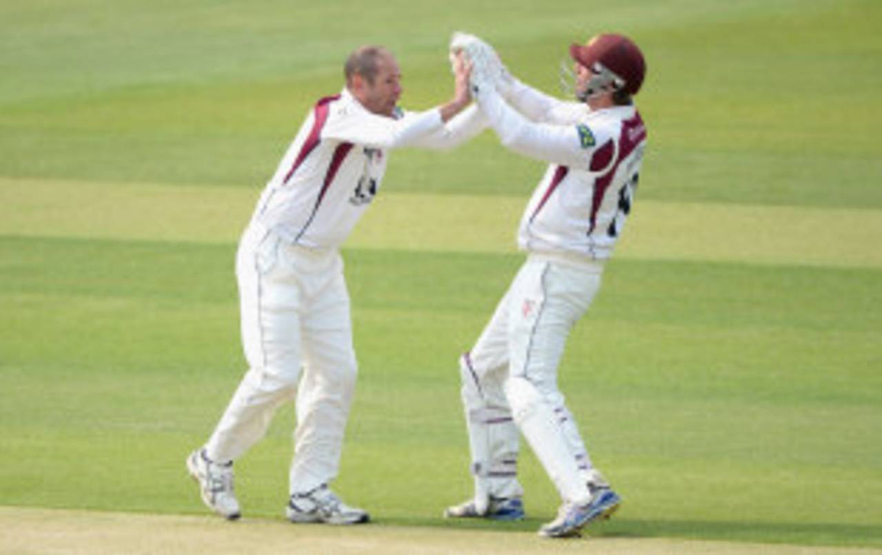 Andrew Hall celebrates a wicket with David Murphy, Yorkshire v Northamptonshire, County Championship, Division One, Headingley, 1st day, April 20, 2014