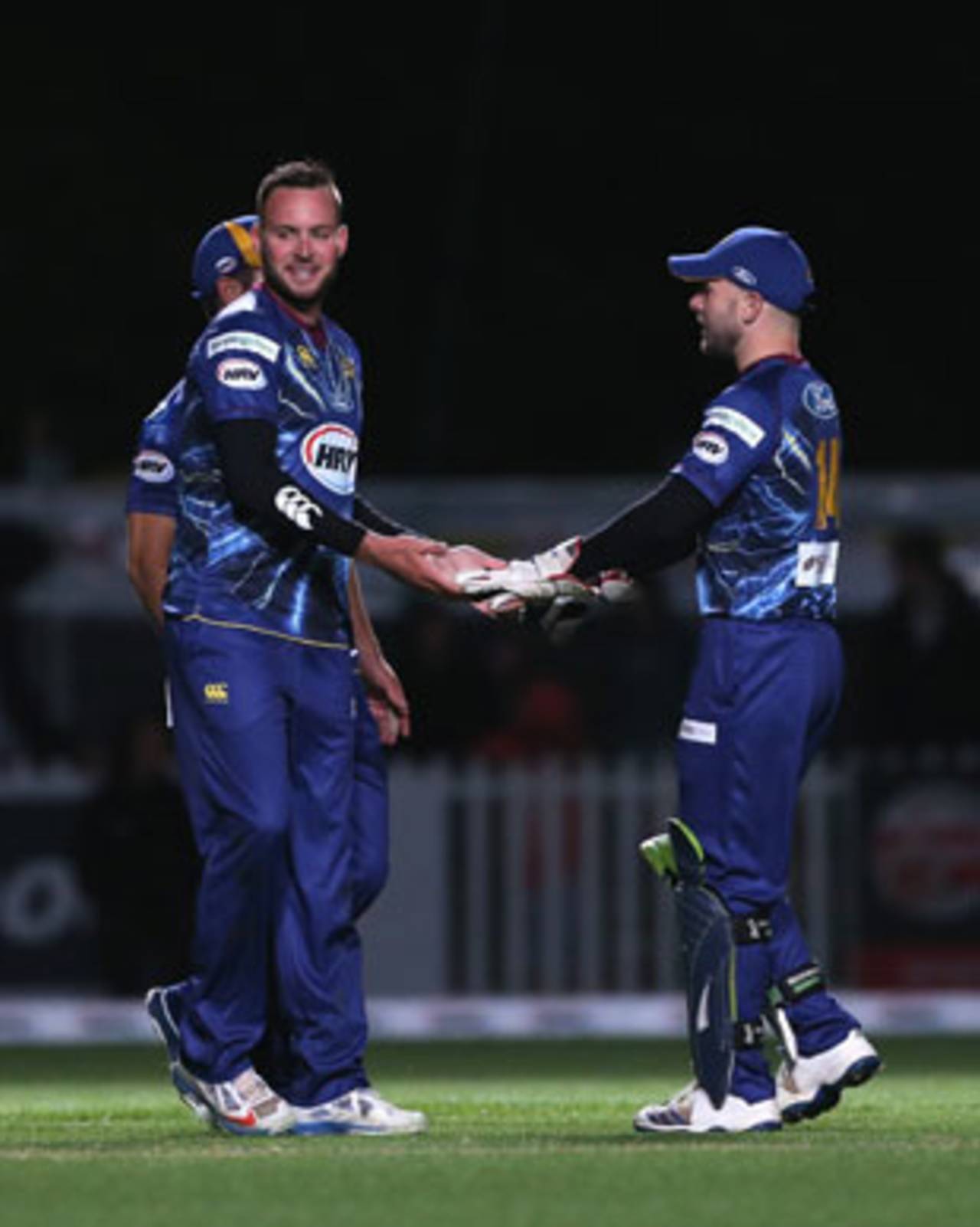 Mark Craig is congratulated by Derek de Boorder, Canterbury Wizards v Otago Volts, HRV Twenty20, Christchurch, November 2, 2013