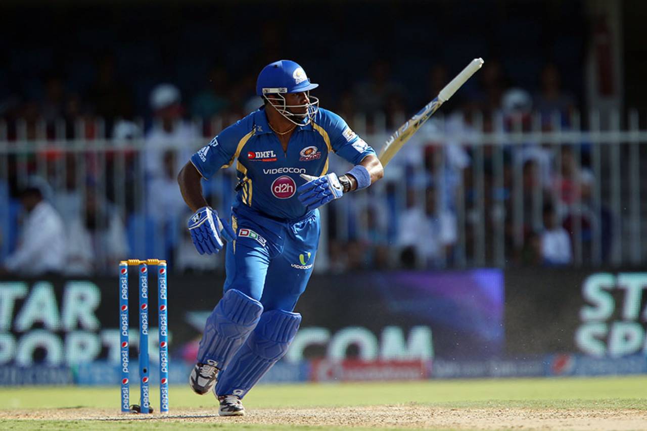 Kieron Pollard loses his bat as he sets off for a run, Daredevils v Mumbai Indians, IPL 2014, Sharjah, April 27, 2014