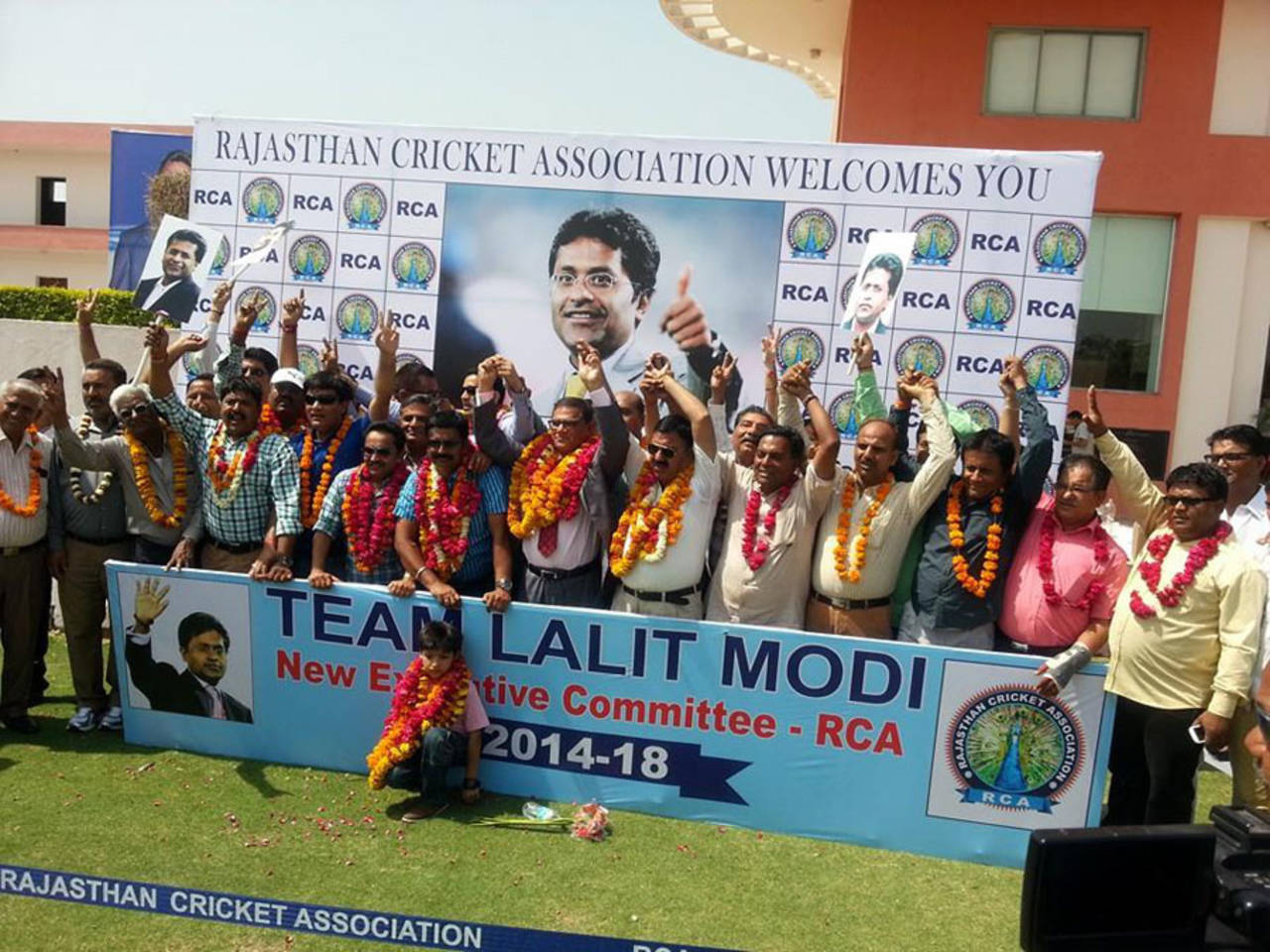 Lalit Modi's supporters celebrate after he is named Rajasthan Cricket Association president in Jaipur on May 6, 2014