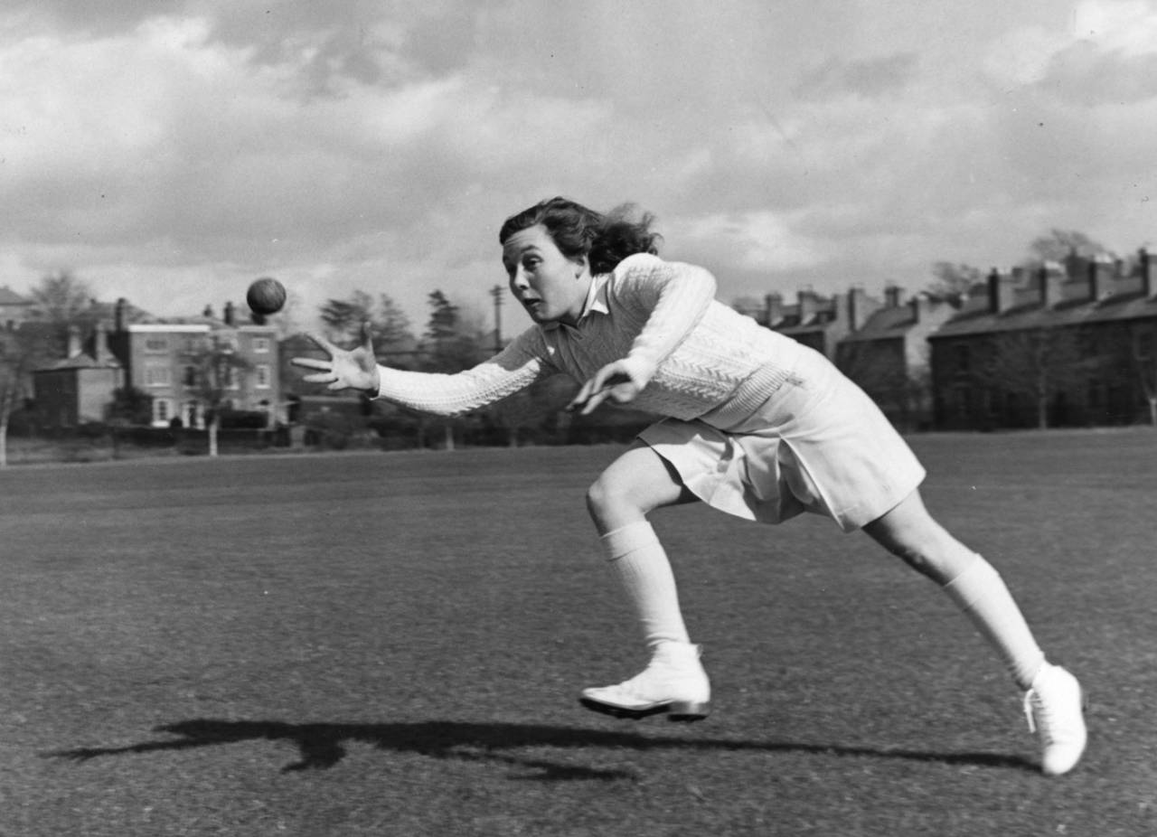 Hazel Sanders catches a ball during practice, May 5, 1951