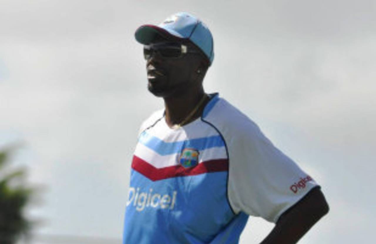 Sir Curtly Ambrose looks over a training session, Barbados, May 26, 2014