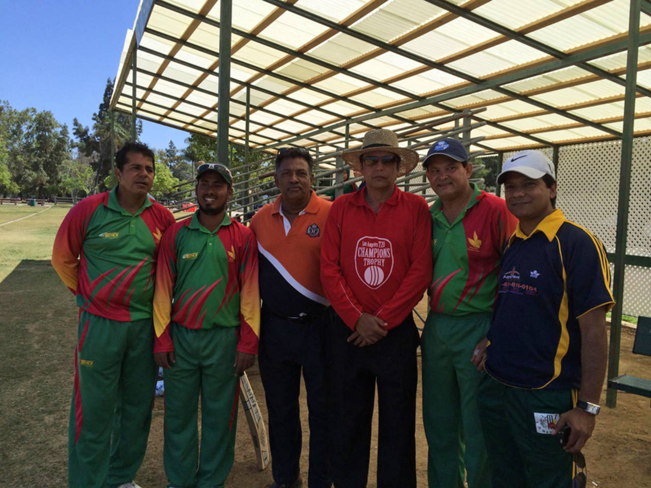 Mohammad Ashraful (second from left) and umpire Nadir Shah (third from right) at the LA T20 Championship