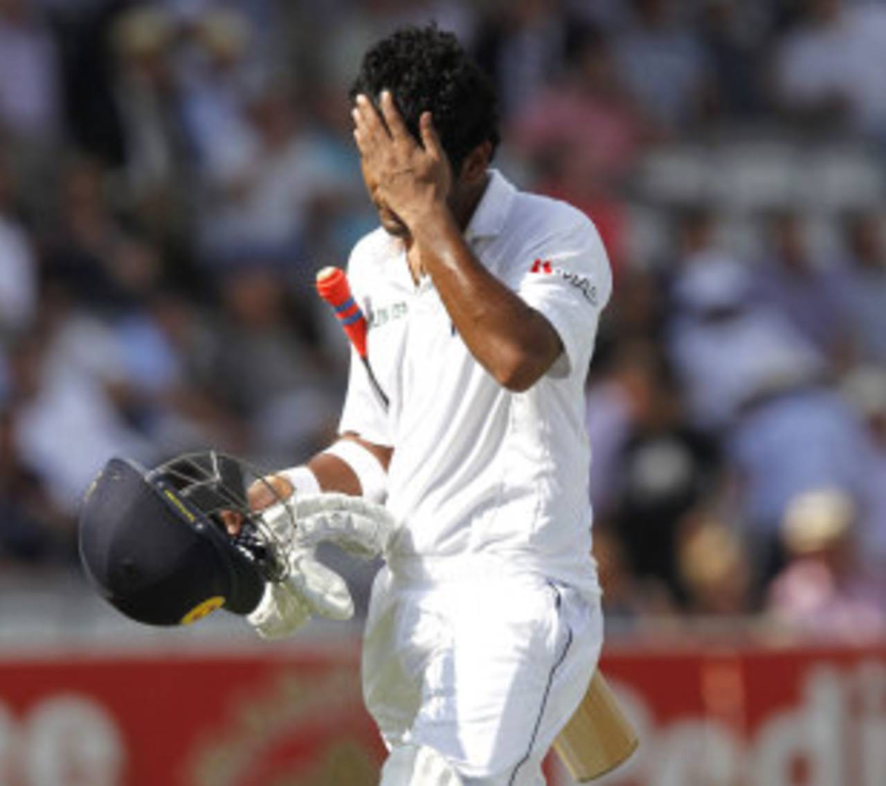 Dimuth Karunaratne walks off after being dismissed, England v Sri Lanka, 1st Investec Test, Lord's, 2nd day, June 13, 2014