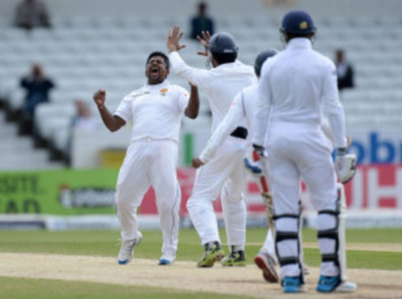 Rangana Herath roars out a celebration, England v Sri Lanka, 2nd Investec Test, Headingley, 5th day, June 24, 2014