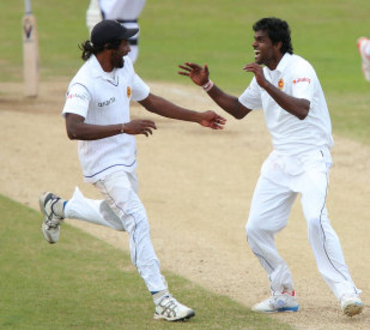 Sri Lanka's fast-bowling competition finds, Nuwan Pradeep and Shaminda Eranga, celebrate victory&nbsp;&nbsp;&bull;&nbsp;&nbsp;Getty Images