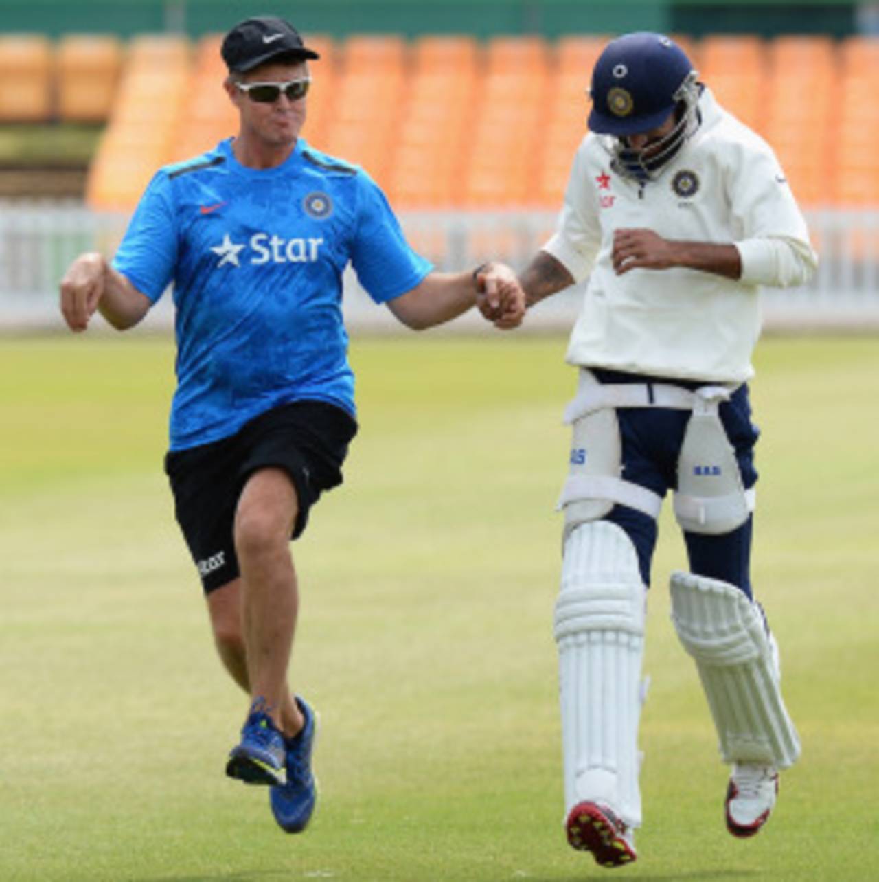No one chickens out: Trevor Penney hauls Shikhar Dhawan along , Leicester, June 25, 2014 