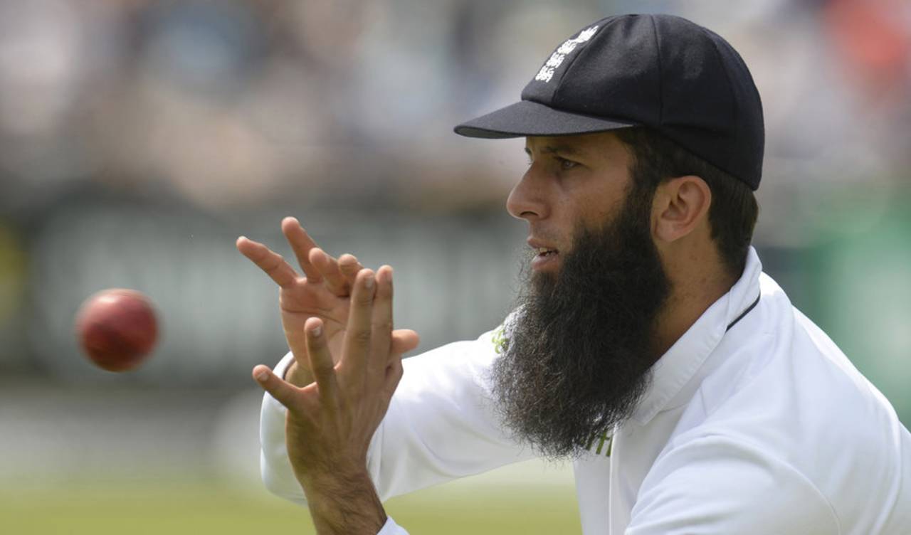 Moeen Ali warms up to take the field, Headingley, June 20, 2014