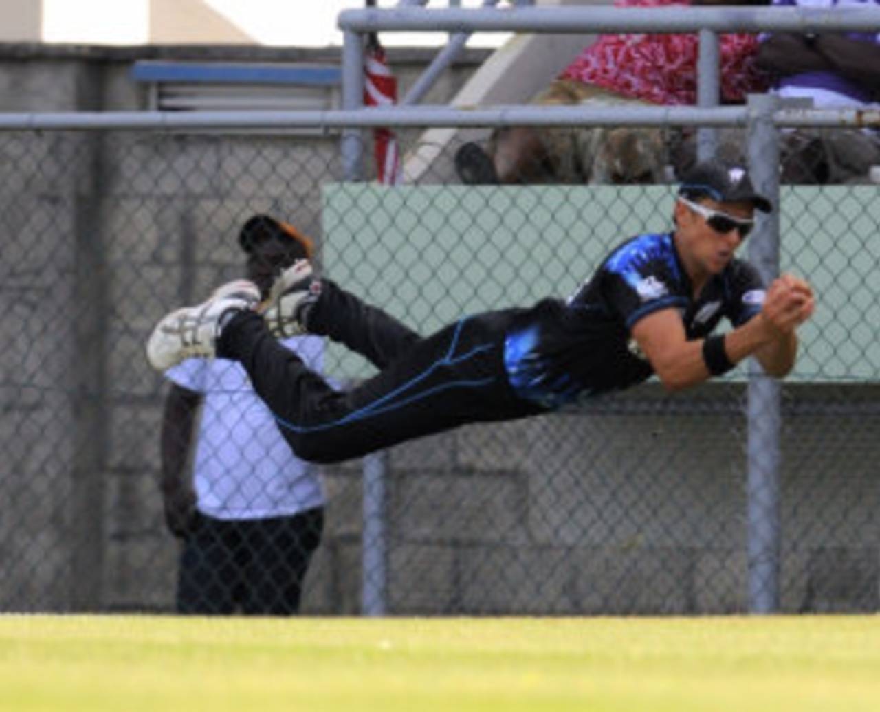 Trent Boult goes airborne to complete a stunning catch, West Indies v New Zealand, 2nd T20I, Dominica, July 6, 2014