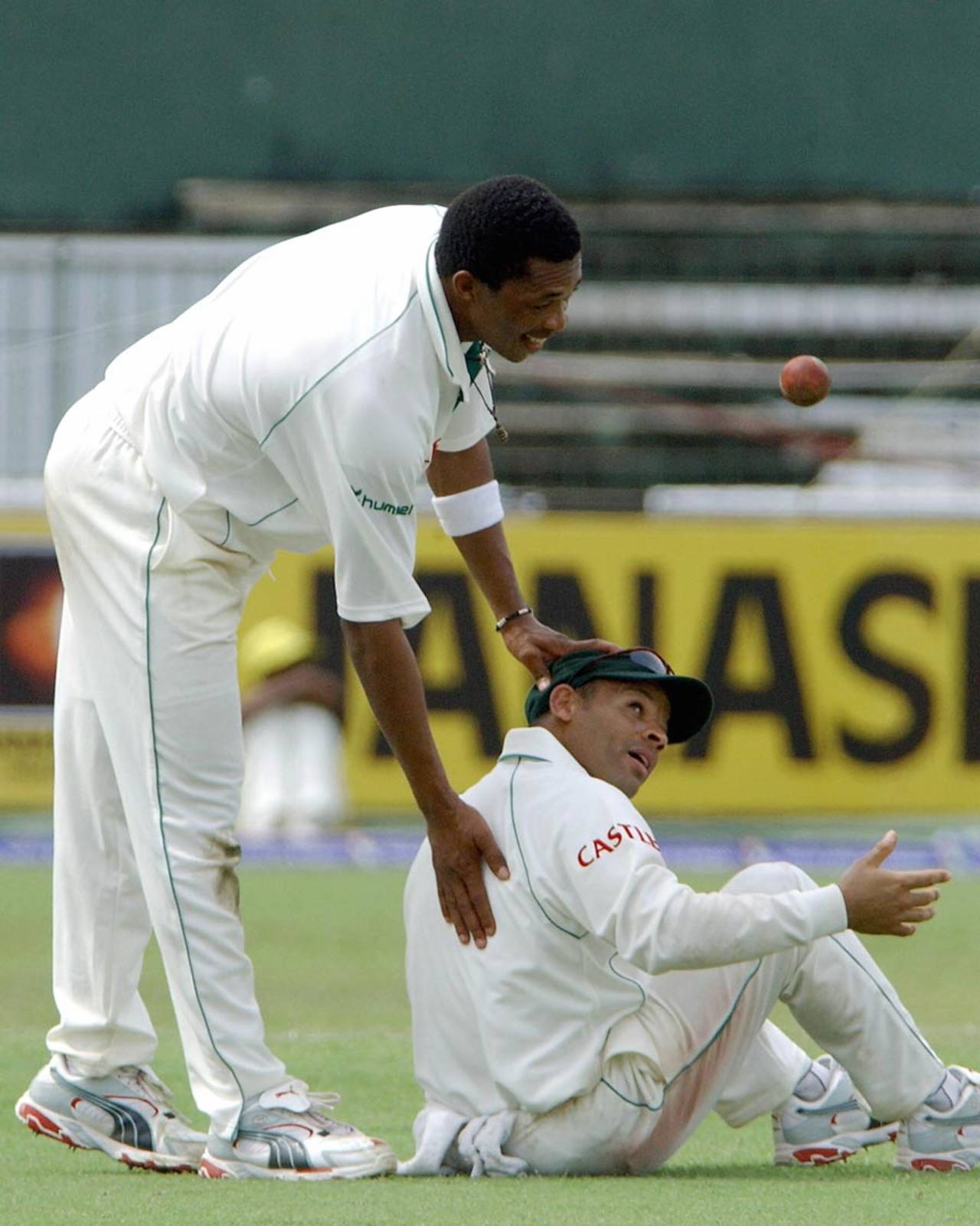 Makhaya Ntini pats Ashwell Prince on the back, first Test, Sri Lanka v South Africa, SSC, Colombo, July 28, 2006