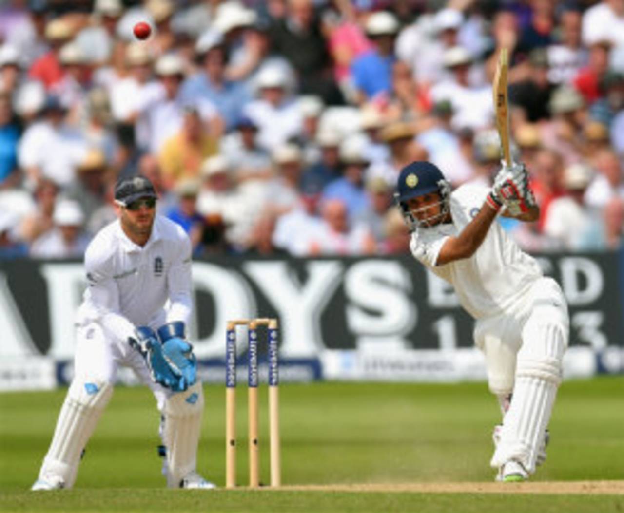 Picture perfect: Bhuvneshwar Kumar plays an inside-out cover drive, England v India, 1st Investec Test, Trent Bridge, 2nd day, July 10, 2014