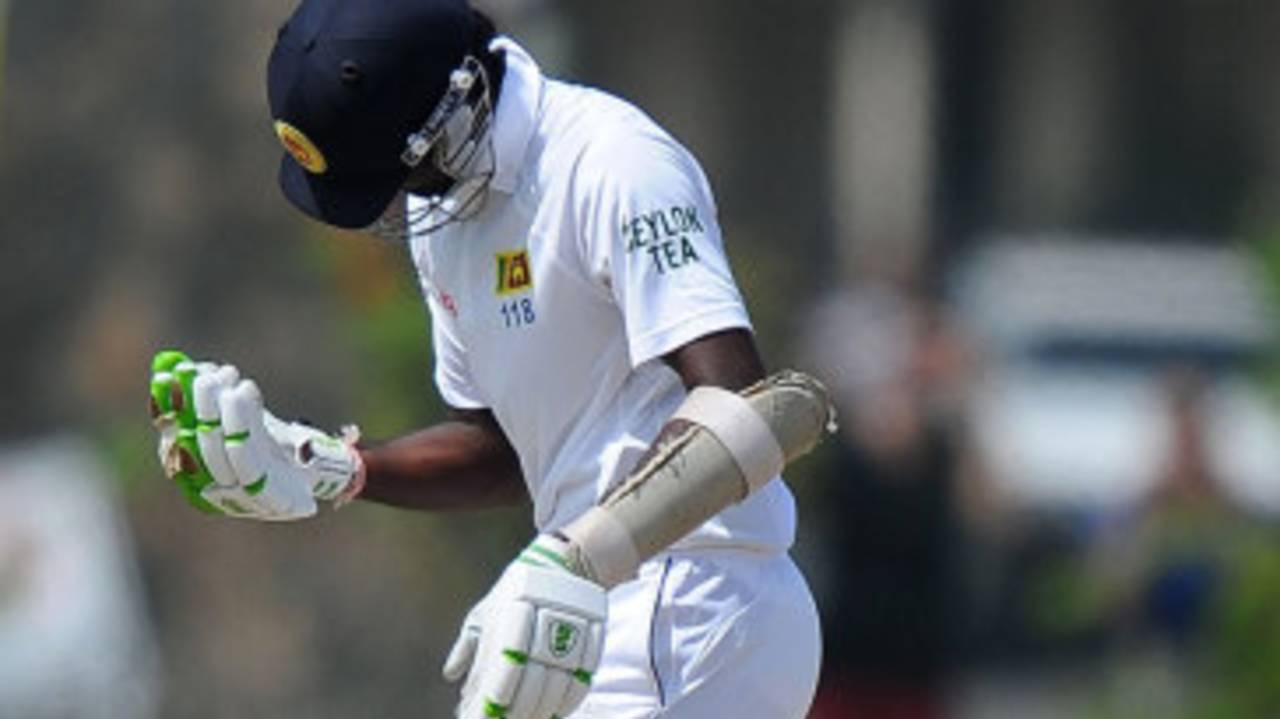 Shaminda Eranga checks his injured hand after a delivery from Dale Steyn, Sri Lanka v South Africa, 1st Test, Galle, 4th day, July 19, 2014