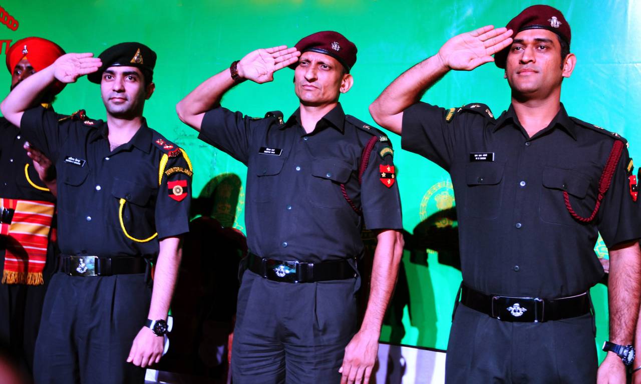 MS Dhoni (right) and shooter Abhinav Bindra (left) salute after being conferred the rank of Lieutenant Colonel in the Territorial Army, Delhi, November 1, 2011
