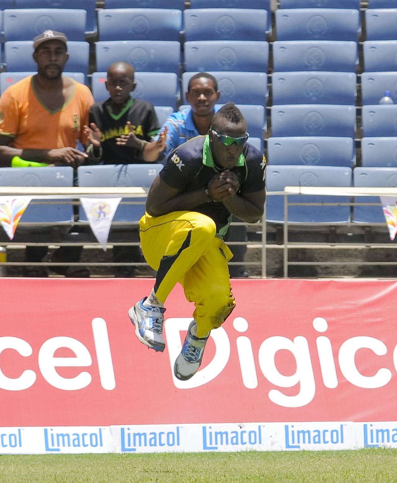 Andre Russell clings onto a catch to remove Jimmy Neesham, Jamaica Tallawahs v Guyana Amazon Warriors, CPL 2014, Kingston, August 2, 2014