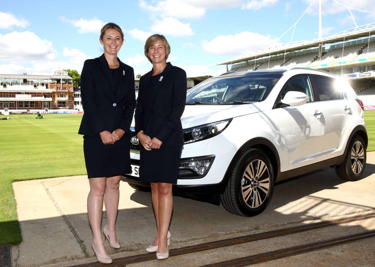 England captain Charlotte Edwards and the ECB's head of women's cricket Clare Connor pose with a Kia Sportage during a press conference to announce a new sponsorship deal for the women's team, Lord's, July 14, 2014