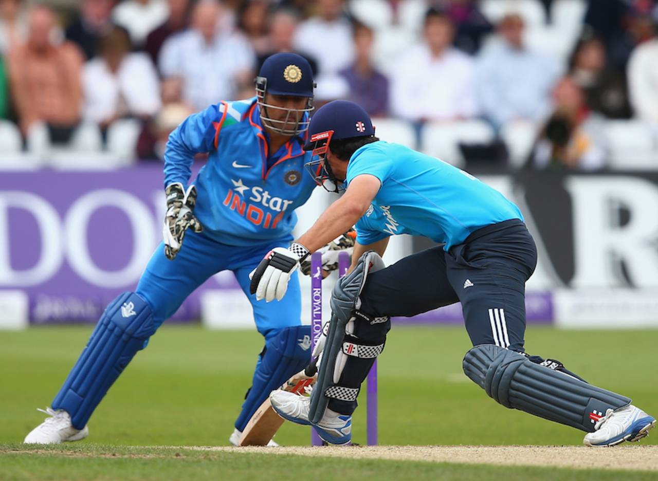 MS Dhoni whips the bails off after Alastair Cook misses one on the charge, England v India, 3rd ODI, Trent Bridge, August 30, 2014