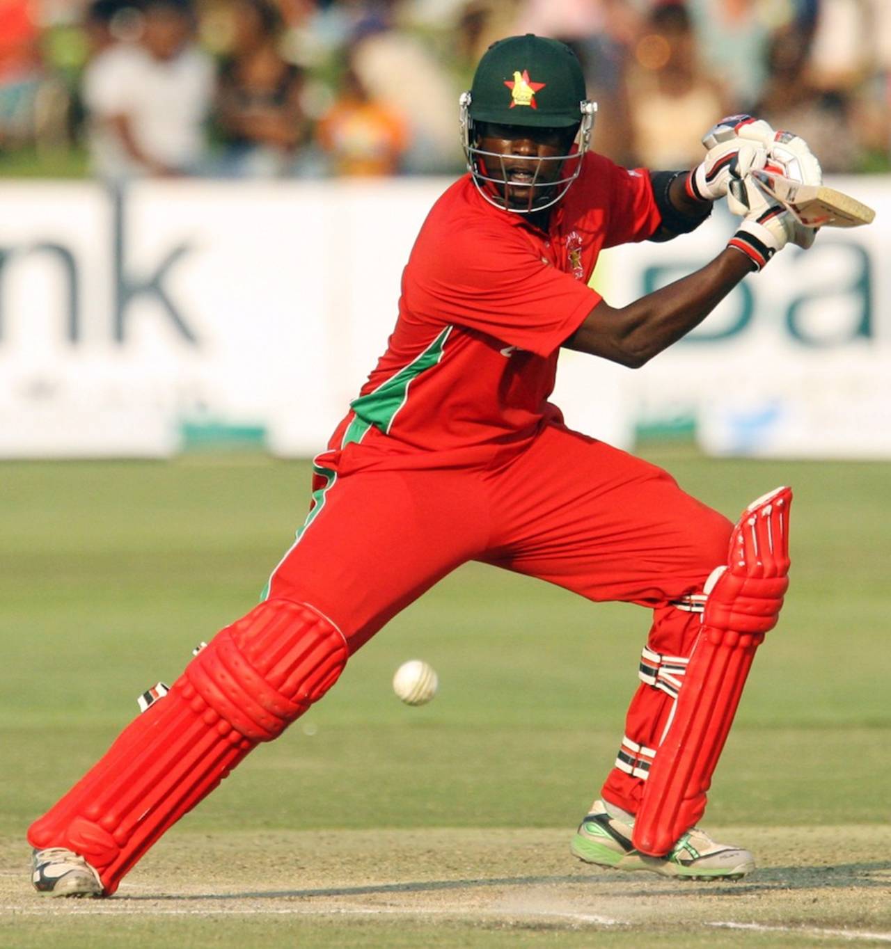 Elton Chigumbura drives during his half-century, Zimbabwe v Australia, tri-series, Harare, August 31, 2014