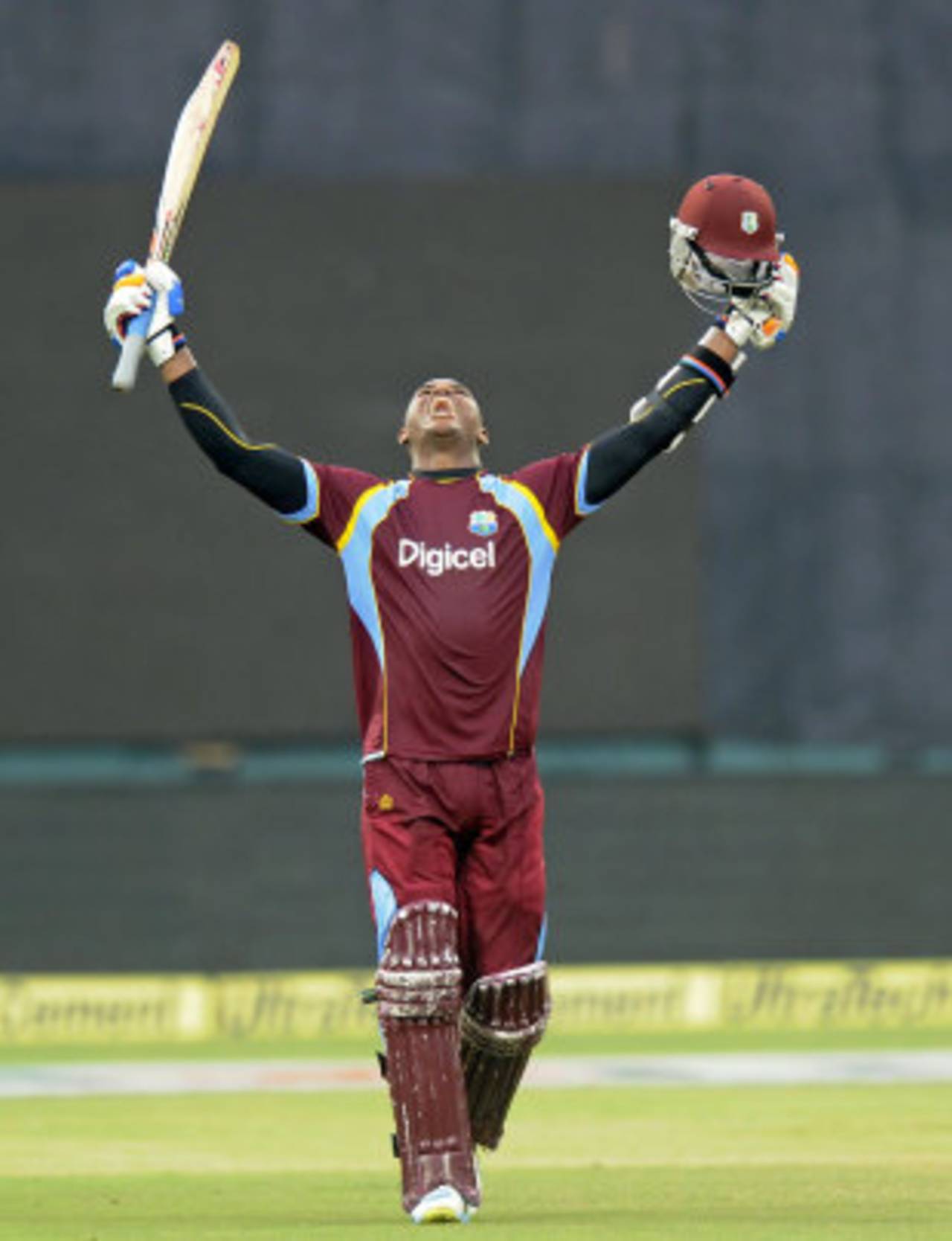 Marlon Samuels exults after scoring a century, India v West Indies, 1st ODI, Kochi, October 8, 2014