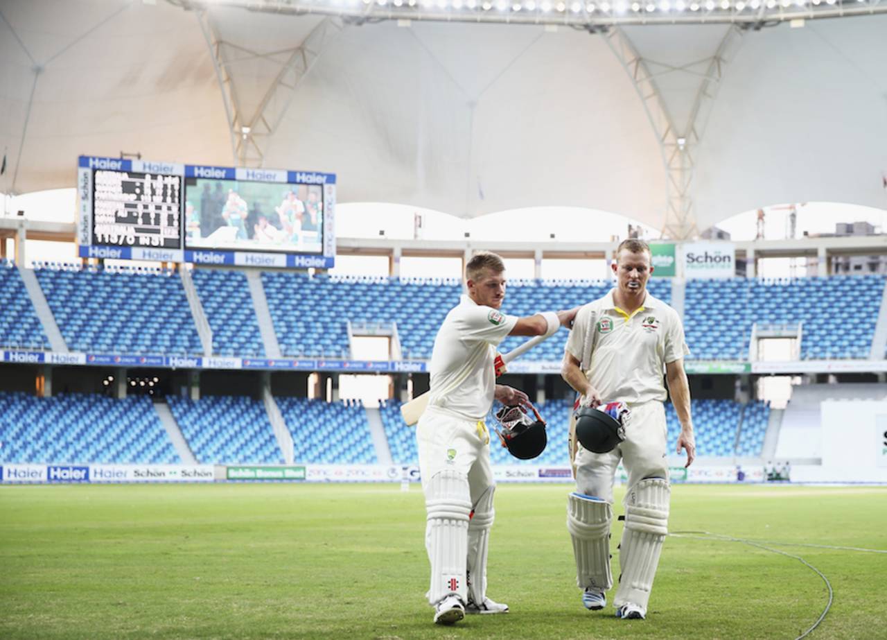 Chris Rogers gets a pat from David Warner after the day's play, Pakistan v Australia, 1st Test, Dubai, 2nd day, October 23, 2014