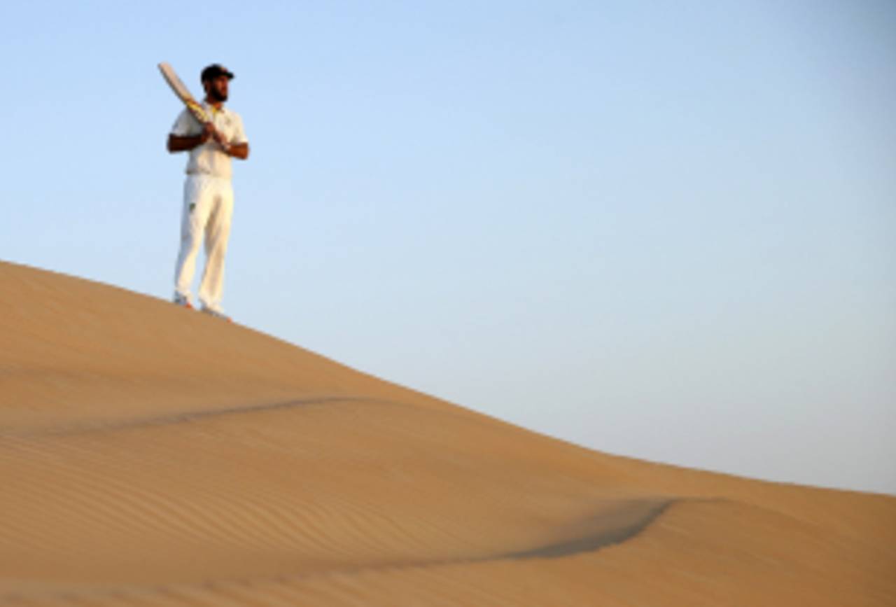 Glenn Maxwell looks out over the Al Khatim Sand Dunes, Abu Dhabi, October 29, 2014