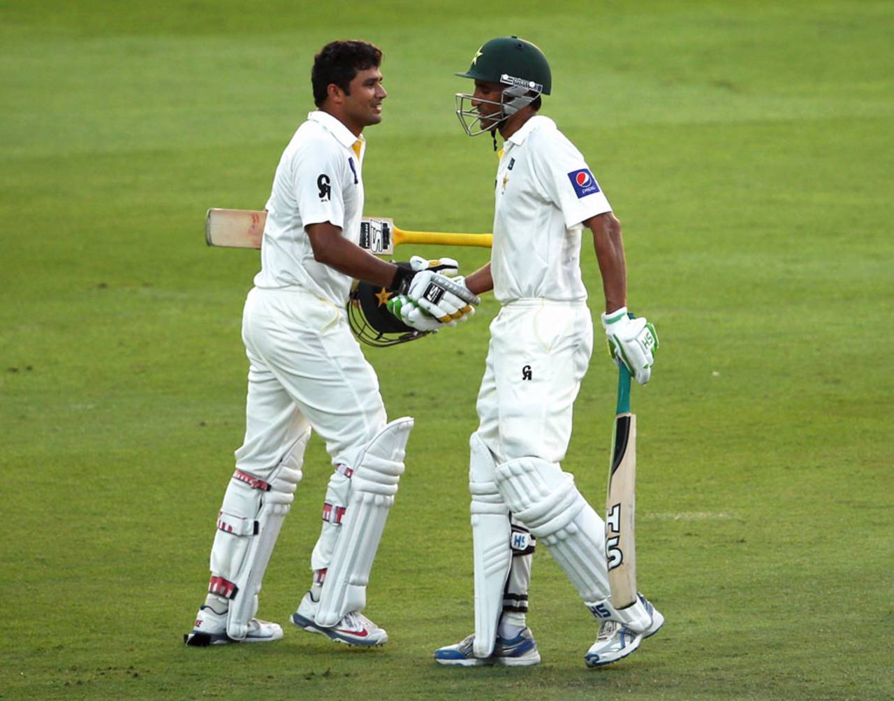 Younis Khan congratulates Azhar Ali on his century, Pakistan v Australia, 2nd Test, Abu Dhabi, 1st day, October 30, 2014